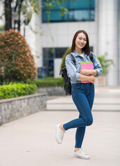 Wall Mural - Young Asian student at school