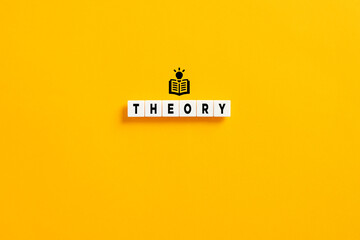 white letter blocks on yellow background with the word theory. theoretical knowledge, principles and