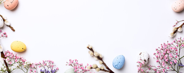 Wall Mural - Beautiful Easter composition with spring flowers and colorful quail eggs over white background. Springtime and Easter holiday banner concept with copy space. Top view