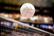 Volleyball Ball And Net In Voleyball Arena During A Match.