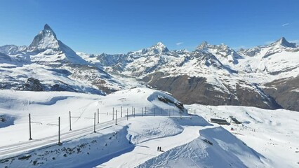 Wall Mural - Beautiful Zermatt ski resort with view of the Matterhorn peak on the horizon. Beautiful Swiss Alps.