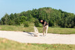 © freebird7977 - Asia Golfer man hitting out of a sand trap. The golf course is on the sand.  Hobby in holiday and vacations on club golf. Lifestyle and Sport Concept