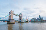 Fototapeta Londyn - tower bridge in london at evening, cloudy daytime
