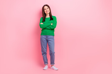 Sticker - Full length photo of dreamy pretty lady dressed green pullover arms folded looking emtpy space isolated pink color background