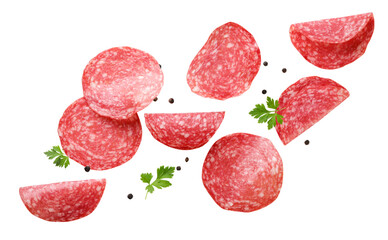 Wall Mural - Sliced sausage with parsley leaves and peppercorns are flying on a white background.