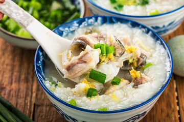 Sticker - Chinese cuisine: a bowl of delicious fish porridge