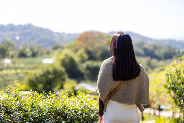 Poster - Woman look at the natural view in countryside