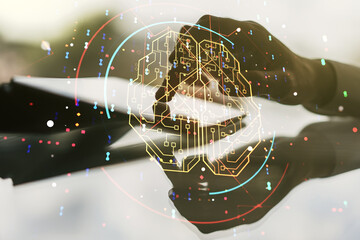 Poster - Double exposure of creative human brain microcircuit and hand working with a digital tablet on background. Future technology and AI concept