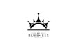 A creative logo design where the shape of the crown is combined with the shape of the sun in a simple flat concept.