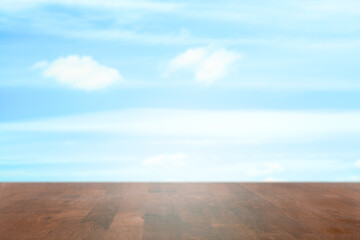 Wall Mural - wooden table, blue sky