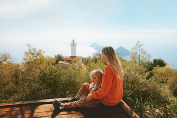 Wall Mural - Mother and child traveling in Turkiye outdoor family summer vacations lifestyle hiking Lycian way Gelidonya lighthouse landscape