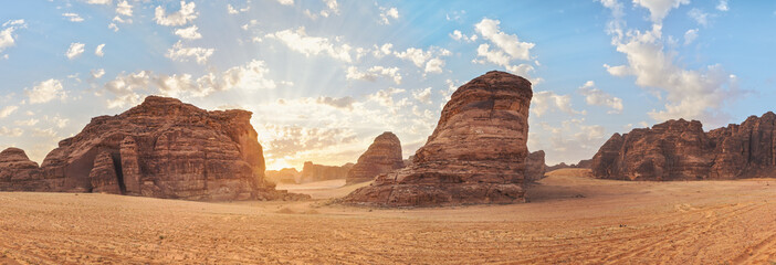 morning sun shines over rocky desert formations, typical landscape in al ula, saudi arabia. high res