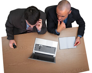 Business men using laptop while making report in office