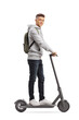 © Ljupco Smokovski - Generation z male riding an electirc scooter and looking at camera