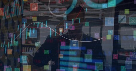 Poster - Animation of network of digital icons over caucasian businessman talking on smartphone at office