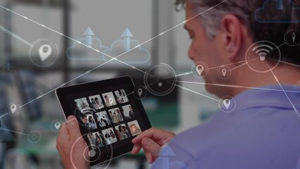Poster - Animation of connected icons and clouds with arrows over diverse man using digital tablet
