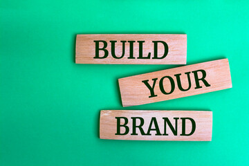 Wall Mural - Wooden blocks with words 'Build Your Brand'.