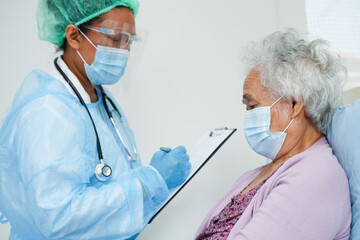 Wall Mural - Doctor check Asian elder senior woman patient wearing a mask for protect covid coronavirus.