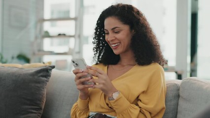 Wall Mural - Woman laugh, phone and typing on a living room sofa feeling happy on a work break with mobile. Website, networking notification and social media scroll of a young person on web communication app