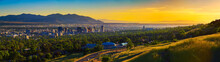 Salt Lake City Skyline At Sunset With Wasatch Mountains In The Background, Utah
