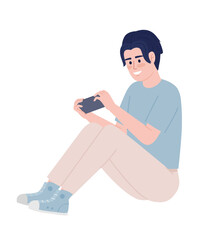 Poster - Excited young man with handheld gaming console semi flat color vector character. Editable figure. Full body person on white. Simple cartoon style spot illustration for web graphic design and animation