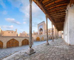 Wall Mural - Khiva, Uzbekistan. View of Khojamberdibai Madrassah from Ak Mosque