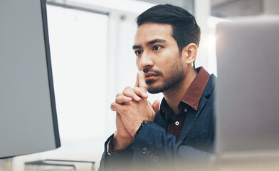 Poster - Office, concentration and face of man at computer thinking or brainstorming ideas for online project. Planning, analytics and Indian businessman on internet search for startup business idea at desk.