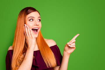 Sticker - Portrait of shocked laughing young woman with open mouth and palm near cheek showing by her fingers on yellow background with copy space for text