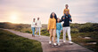 © Anela R/peopleimages.com - Black family, walking or sunset with parents, children and grandparents spending time together in nature. Spring, love or environment with kids and senior relatives taking a walk while bonding