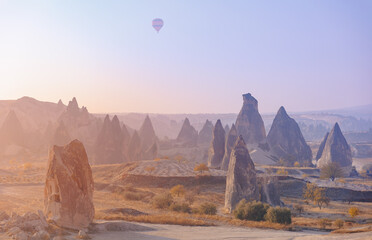 Landscape sunrise in Cappadocia with set colorful hot air balloon fly in sky with sun light. Concept tourist travel Goreme Turkey