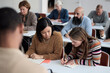 © Johnér - Group of adults sitting in class