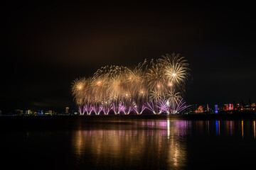 Wall Mural - Beautiful fireworks celebrate at sea