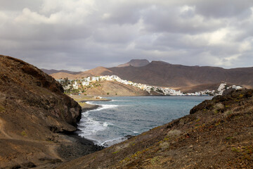 Panoramic view of the Playa de los Pobres bay with Las Playas with the mountain of Cuchillos de Vigán and the desert land of Fuerteventura