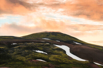 Poster - Volcano mountain with colorful sunset sky in wilderness at Icelandic Highlands