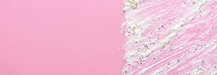 Sticker - The texture of a cosmetic scrub. An exfoliating skin care product. Pink background. Copy space.