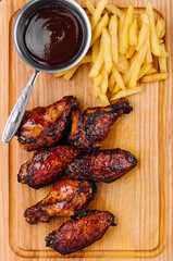 Wall Mural - Fried glazed chicken wings and legs