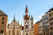 View at the tower of the old town hall and toy museum at Marienplatz pedestrian zone in munich city downtown