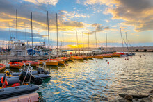 A Colorful Sunset Sky Above The Boats Moored At The Jaffa Port Harbor, The Oldest Seaport In The World, At Jaffa, Israel.