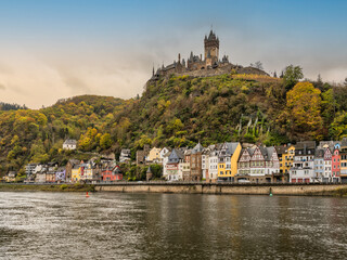 Wall Mural - Cochem riverside buildings and the hill-top castle on Moselle river in Cochem-Zell district in Rhineland-Palatinate, Germany