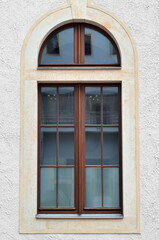 Wall Mural - view of old building with wooden window