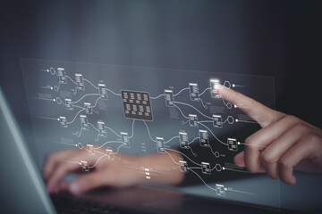 Business people using laptop to automate processes and workflows related to corporate documents.