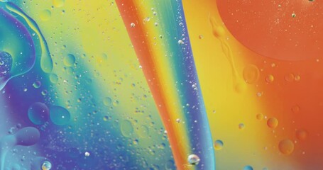 Poster - Animation of bubbles moving on blue and yellow liquid with copy space