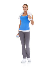 Poster - Ready for a great workout. Healthy young woman holding a bottle of mineral water while isolated on white.