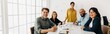 © (JLco) Julia Amaral - Successful business team sitting in a boardroom