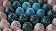 Collection Of Precisely Organized Eggs With Floral Designs. Pink And Blue Easter Background.