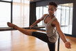 © Mapodile/peopleimages.com - Her body is a beautiful instrument. an attractive young woman practicing in a dance studio.