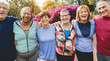 © DisobeyArt - Multiracial senior people having fun after workout exercises outdoor with city park in background - Healthy lifestyle and joyful elderly lifestyle concept