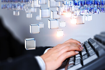 Wall Mural - Hands of a young woman on keyboard