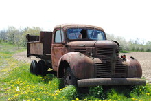 Old Rusty Truck In A Farmer's Field