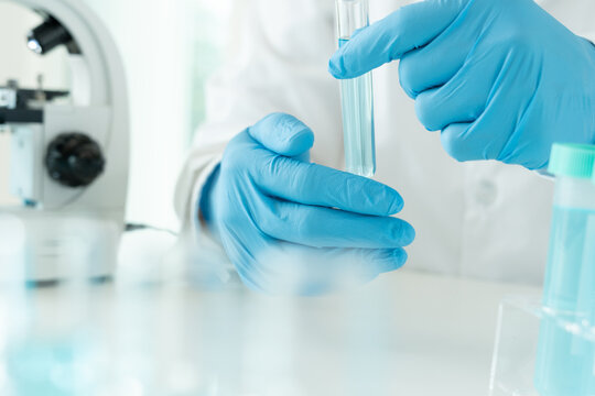 scientist analyze biochemical sample in advanced scientific laboratory. medical professional check c